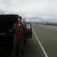 Bobby holds pieces of the broken serpentine belt, which left us stranded on a busy highway.
